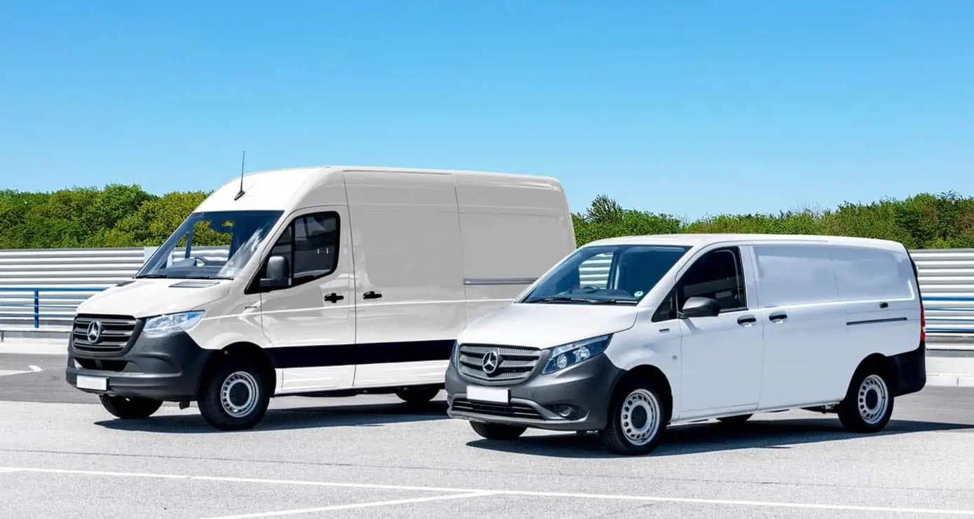 White fleet vans parked outside awaiting scheduled detailing service in Charlotte NC